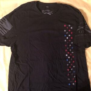 Black grunt style, women’s black T-shirt with red and blue stars